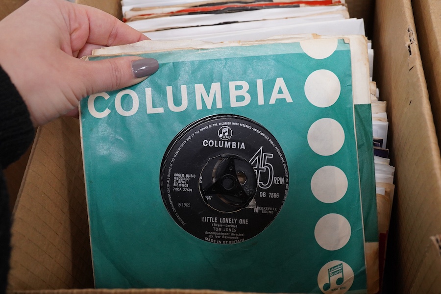 Four boxes of 7 inch singles, on record labels including; Columbia, Pye, Oriole, Stax, Top Rank, Parlophone, etc. artists include; Tom Jones, Otis Redding, The Seekers, Humphrey Lyttelton, Chris Barber, Chuck Berry, Clif